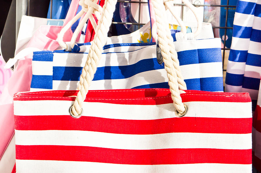 Primary Colors Photograph - Colorful bags #1 by Tom Gowanlock