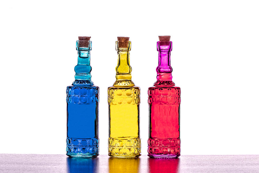 Colorful Bottles  #1 Photograph by Peter Lakomy