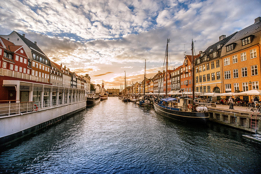 Colorful Traditional Houses in Copenhagen old Town Nyhavn at Sunset #1 Photograph by AleksandarGeorgiev