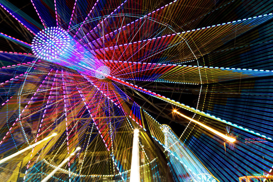 Colourful Lights Of A Moving Ferris #1 Photograph by Michael Interisano