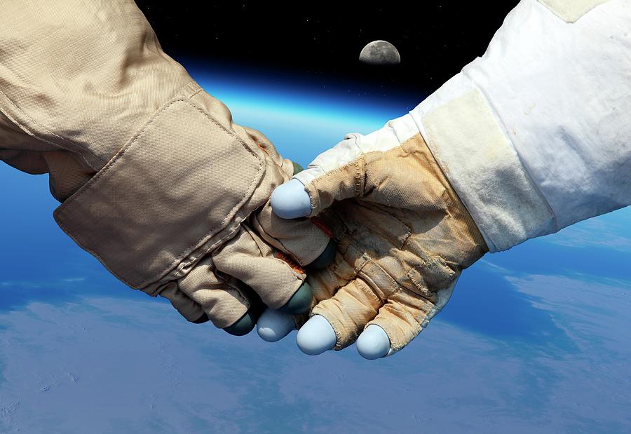 Cosmonaut And Astronaut Shaking Hands #1 Photograph by Detlev Van Ravenswaay