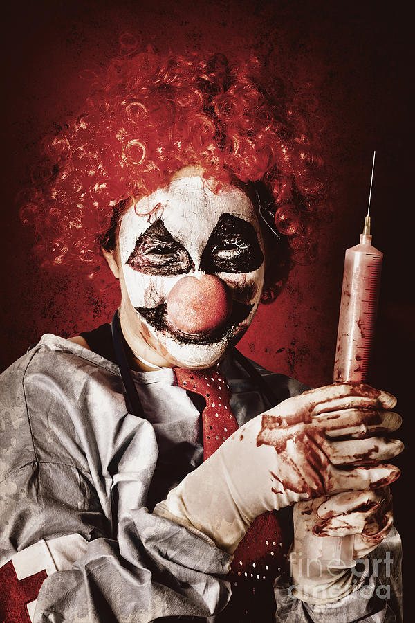 Crazy medical clown holding oversized syringe #1 Photograph by Jorgo Photography