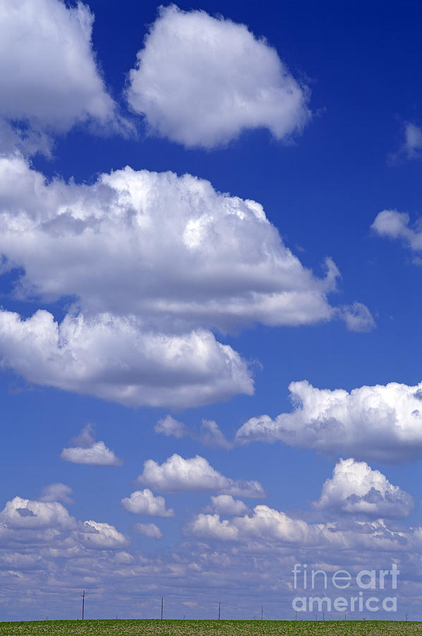 Cumulus clouds in blue sky #2 Photograph by Jim Corwin