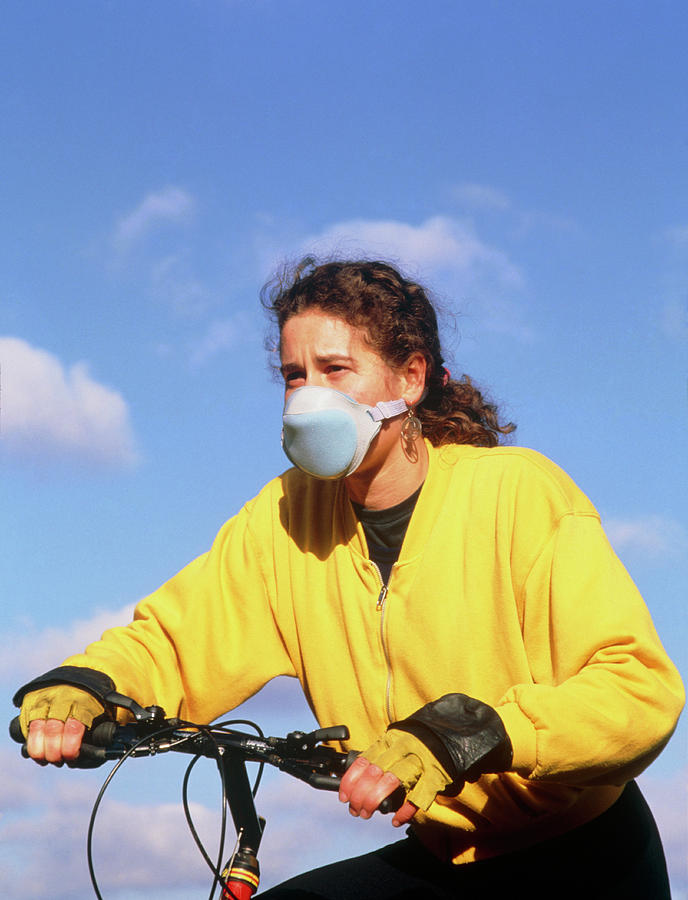 Cyclist Wearing Face Mask To Filter Out Fumes. #1 Photograph by Hattie Young/science Photo Library