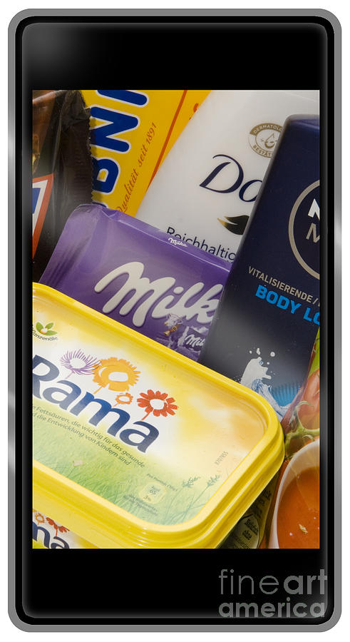 Daily products that contain palm oil are displayed on a smartphone screen #1 Photograph by Urft Valley Art  Matt J G  Maassen-Pohlen
