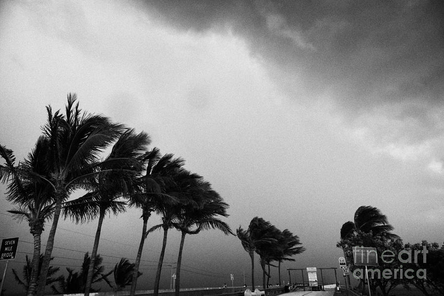 Key Photograph - Dark Rain Storm Clouds Blow Over The Seven-mile Bridge Marathon Key Florida Keys Usa #1 by Joe Fox