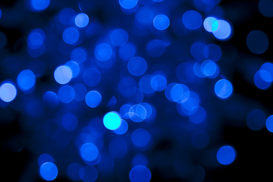 Defocused Blue Light Dots Against Black Background #1 Photograph by Sebastian-julian