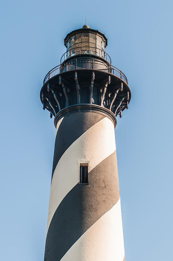 Diagonal black and white stripes mark the Cape Hatteras lighthou #1 Photograph by Alex Grichenko