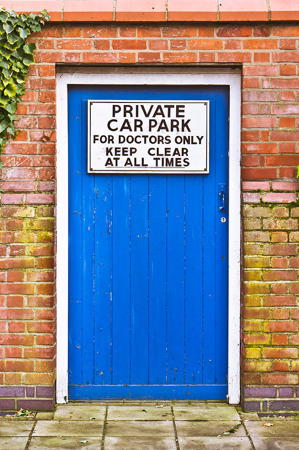 Architecture Photograph - Doctors parking #1 by Tom Gowanlock