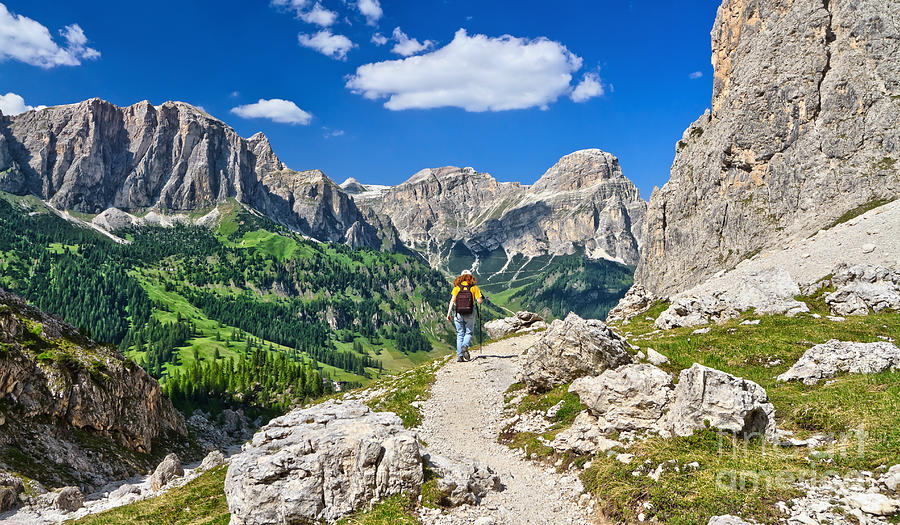 Dolomites - hiker in Badia Valley #1 Photograph by Antonio Scarpi