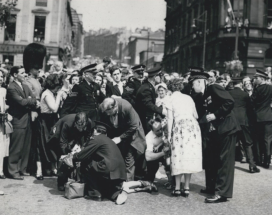 Dozens Of Casualties As Crowds Break Past Troops To Greet #1 Photograph by Retro Images Archive
