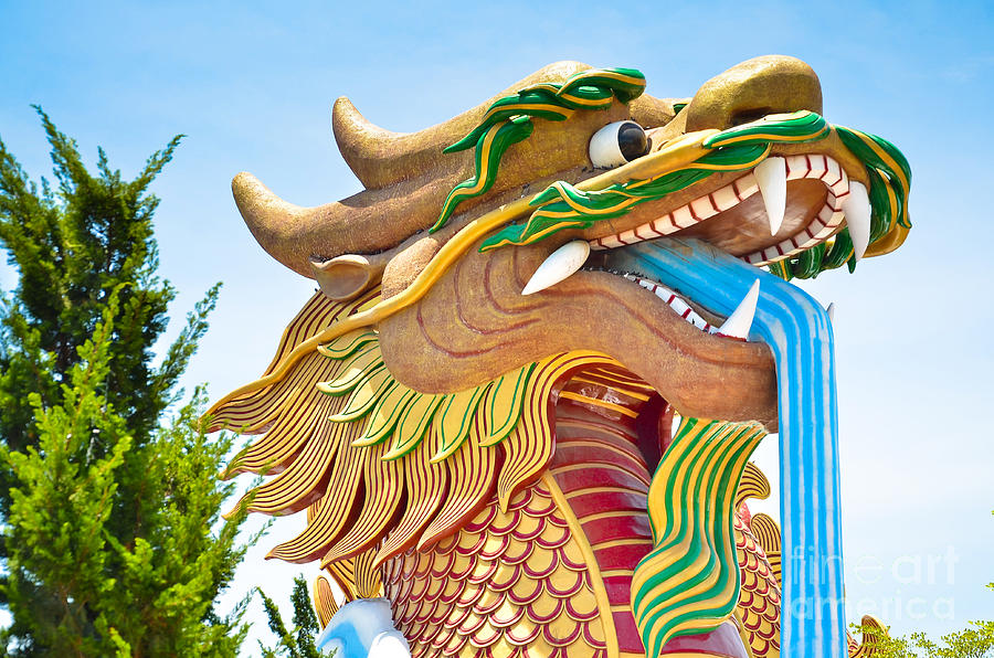 Dragon Photograph - Dragon Ceramic decorate at the top at Pagoda #1 by Keerati Preechanugoon