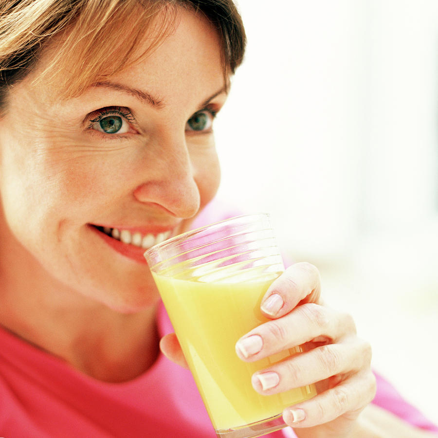 Drinking Orange Juice #1 Photograph by Science Photo Library Drinking Orange Juice #1 Photograph by Science Photo Library