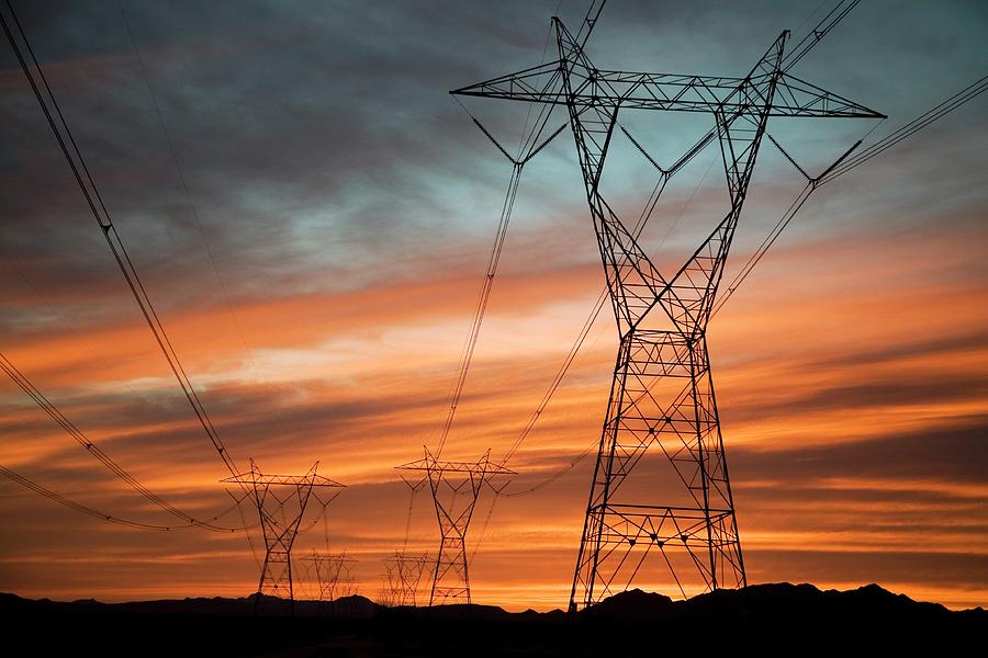 Sunset Photograph - Electricity Pylons #1 by Jim West