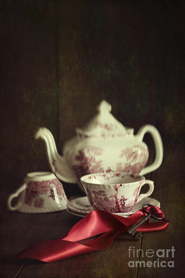 English tea set with key and red satin ribbon #1 Photograph by Sandra Cunningham