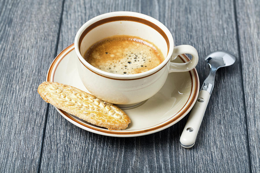 Espresso In Coffee Cup With Biscuit #1 Photograph by Wladimir Bulgar/science Photo Library