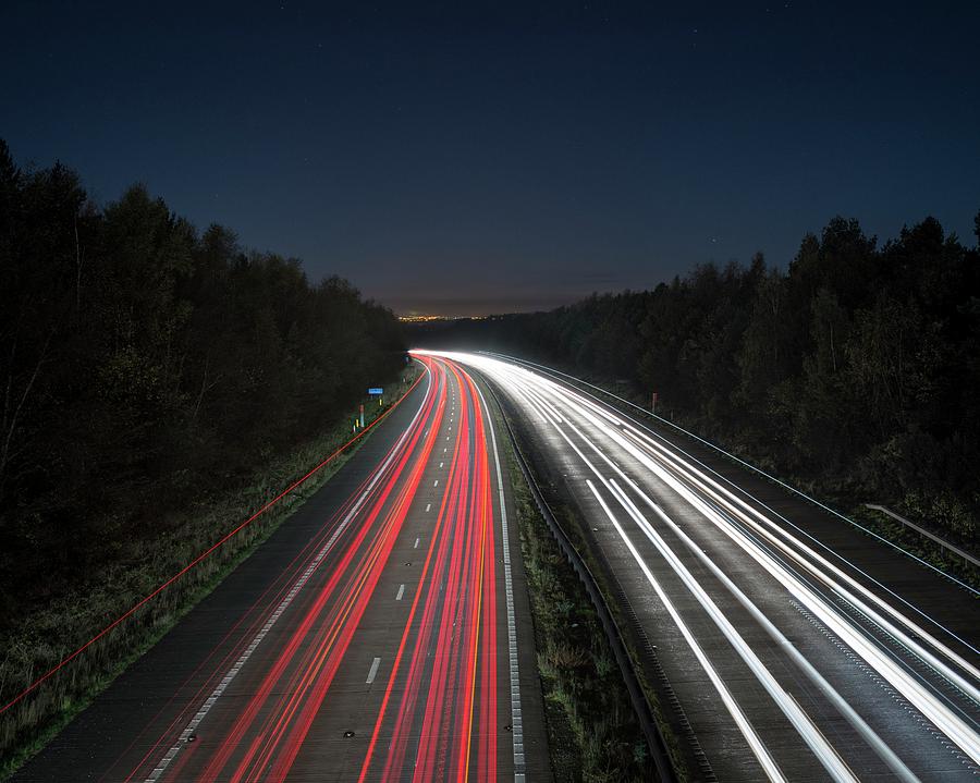 Evening Rush Hour On Motorway #1 Photograph by Robert Brook