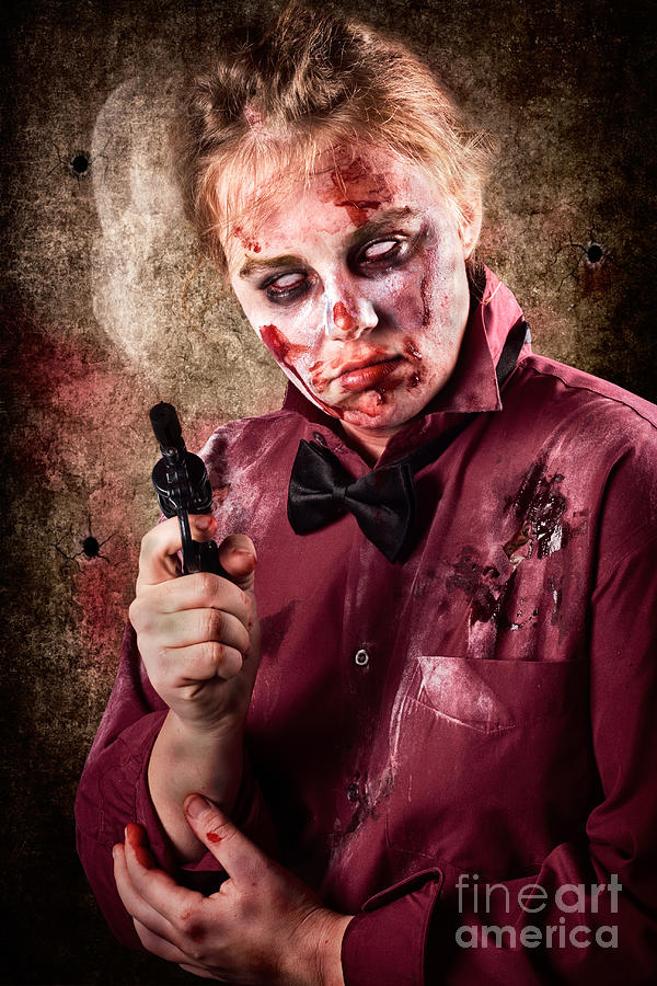 Evil demented zombie holding hand gun. Robbery #1 Photograph by Jorgo Photography