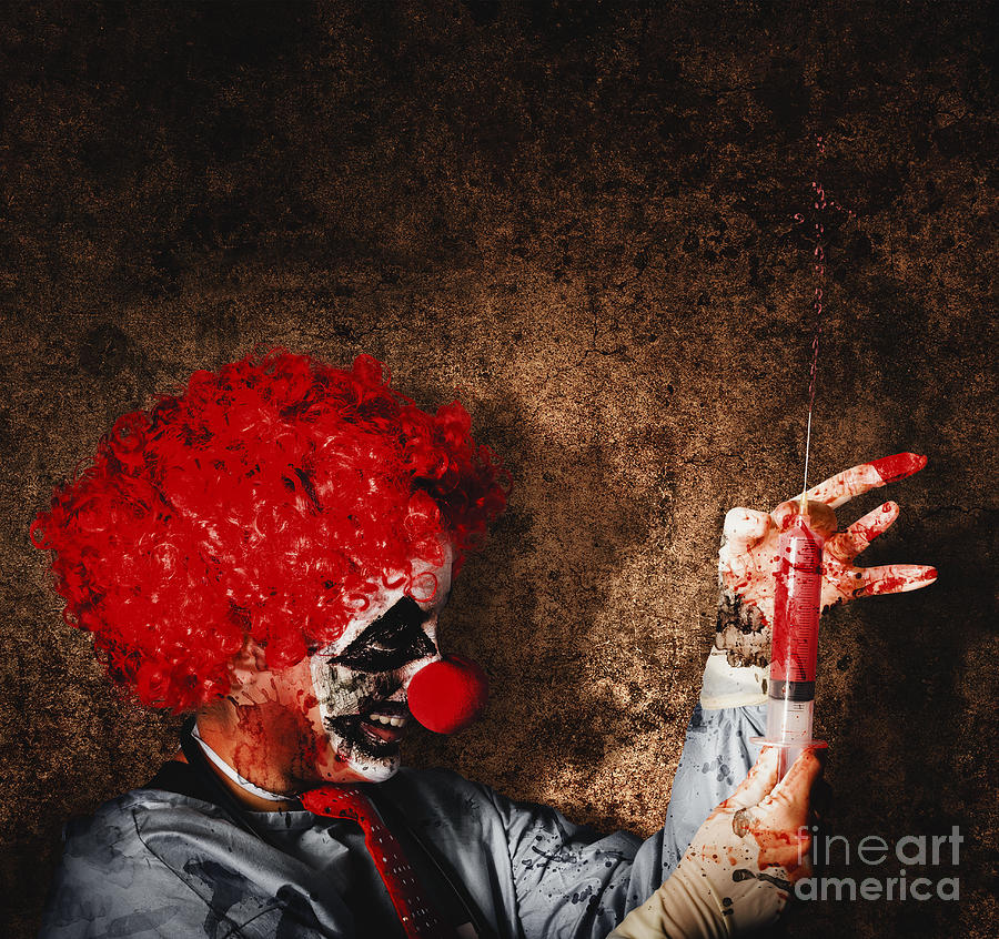 Evil halloween clown with big scary needle #1 Photograph by Jorgo Photography