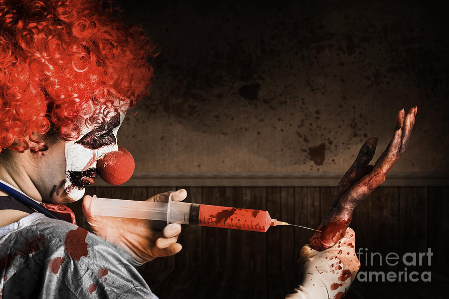 Evil Healthcare clown holding needle and syringe #1 Photograph by Jorgo Photography