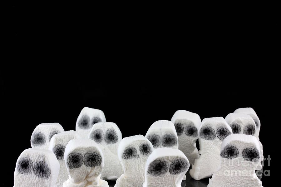 Candy Photograph - Evil white ghosts in a crowd with black space #1 by Simon Bratt