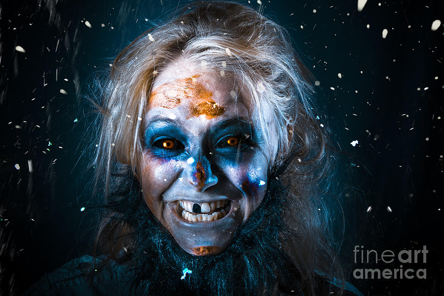 Evil winter monster smiling beneath falling snow #1 Photograph by Jorgo Photography