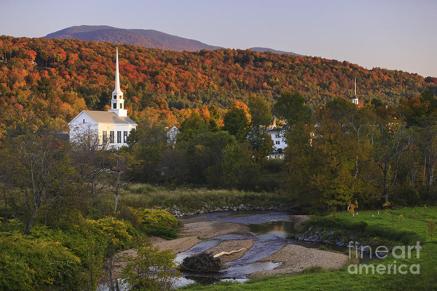 Fall foliage behind a rural Vermont church #1 Photograph by Don Landwehrle