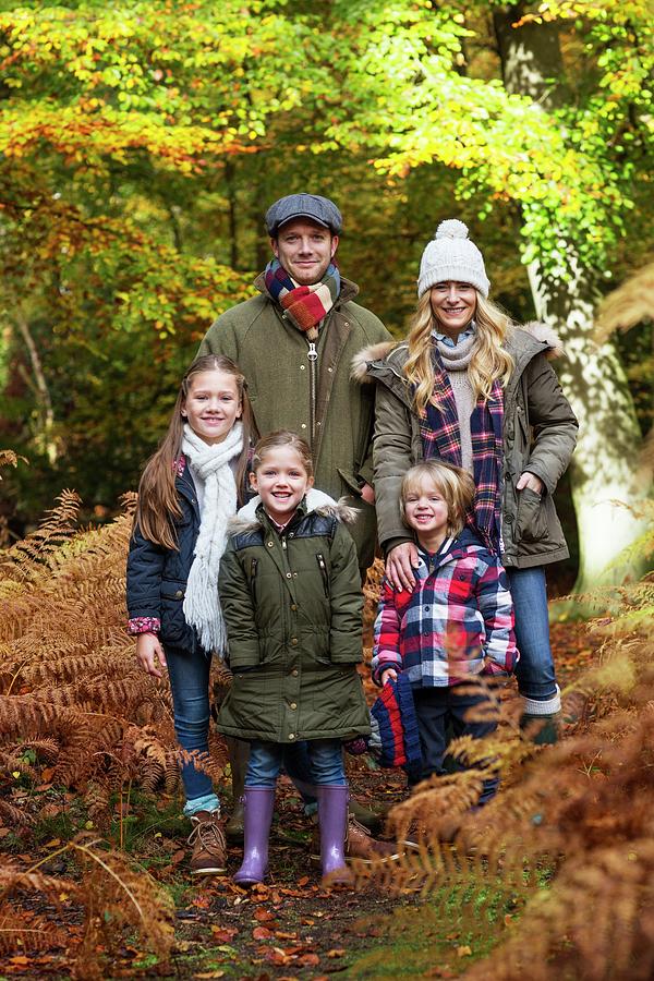 Family In Woods In Autumn #1 Photograph by Science Photo Library