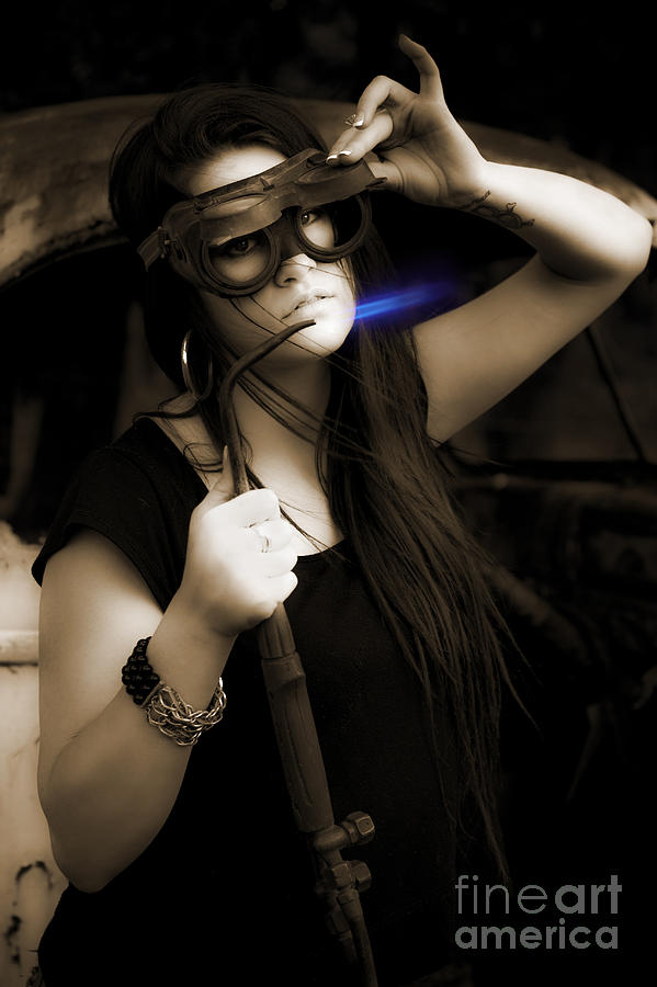 Female Mechanic Using Industrial Welder #1 Photograph by Jorgo Photography