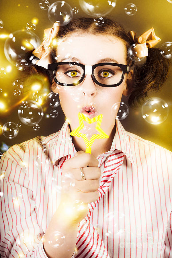 Female Nerd Blowing Bubbles Of Business Success Photograph By Jorgo