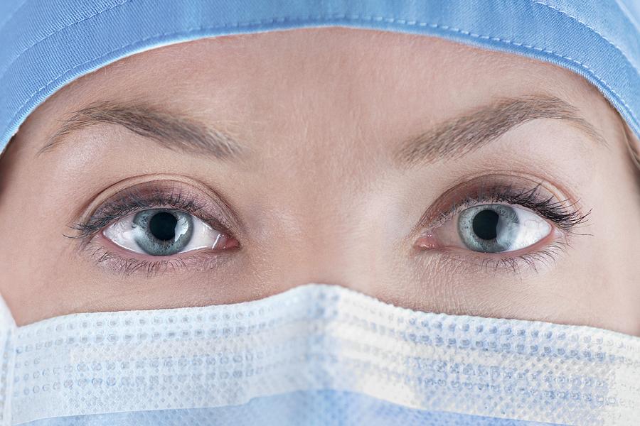 Female Surgeon Wearing Surgical Mask Photograph by Science Photo ...