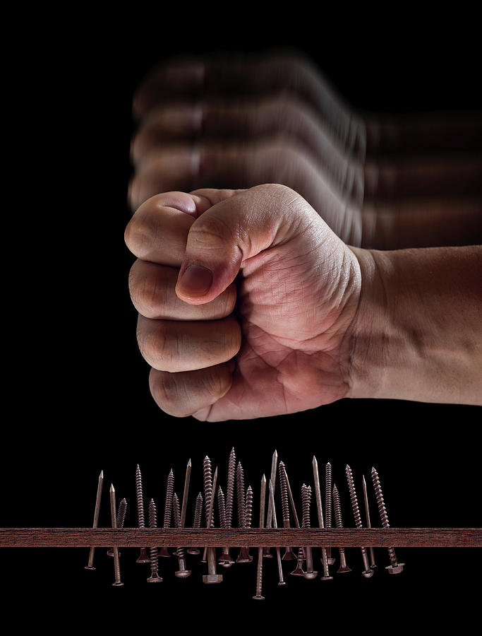 Nail Photograph - Fist Hitting Nails And Screws #1 by Ktsdesign
