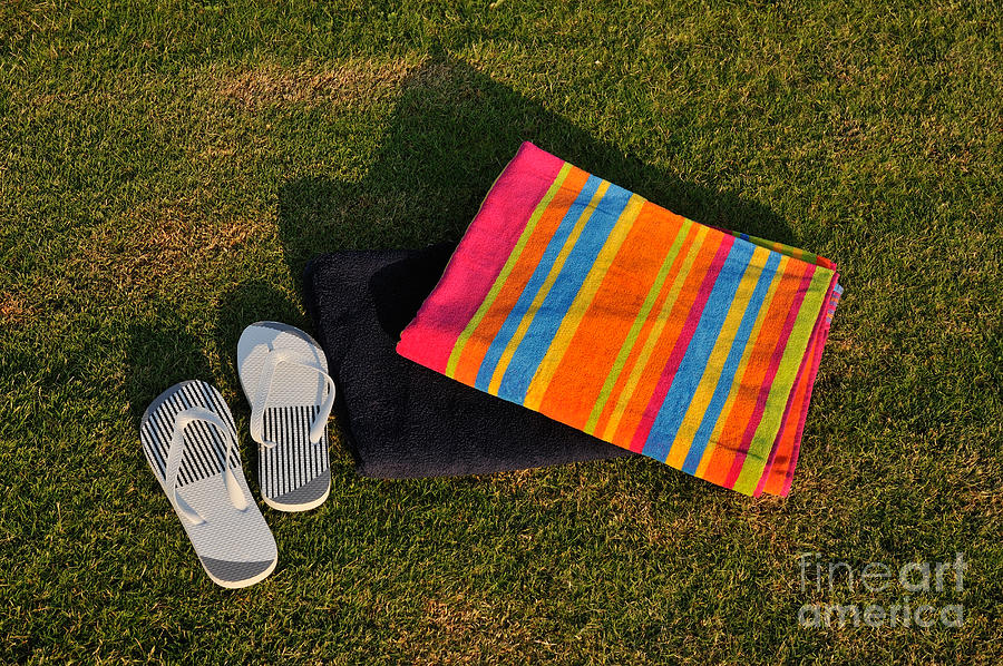 Summer Photograph - Flip flops and towels on grass #1 by George Atsametakis