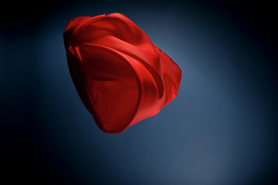 Floating Red Silk On A Dark Blue #1 Photograph by Gm Stock Films