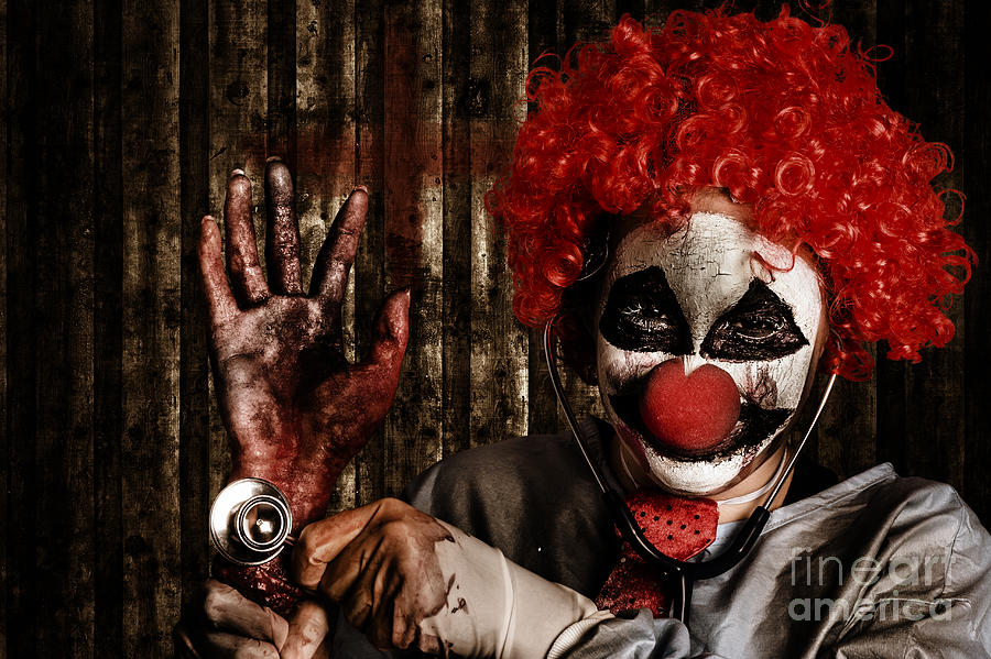 Psycho Movie Photograph - Frightening clown doctor holding amputated hand  #1 by Jorgo Photography