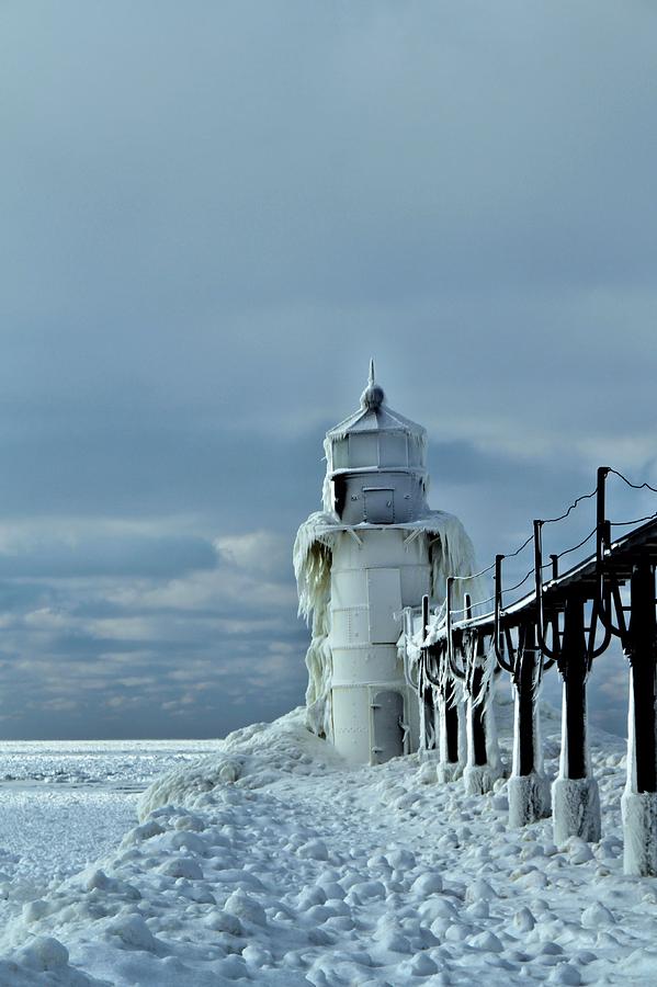 Frozen Lighthouse In Saint Joseph Photograph by Dan Sproul