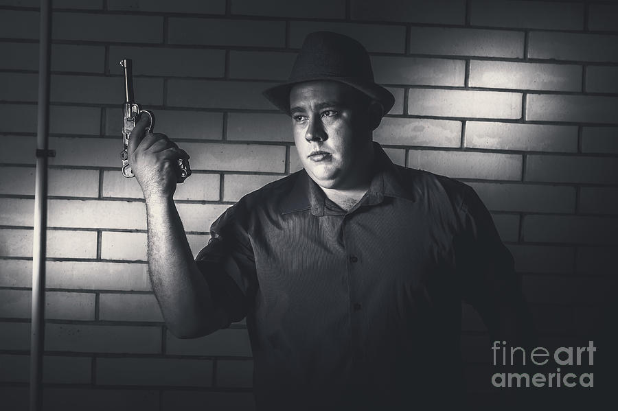Gangster man surrendering during armed holdup #1 Photograph by Jorgo Photography