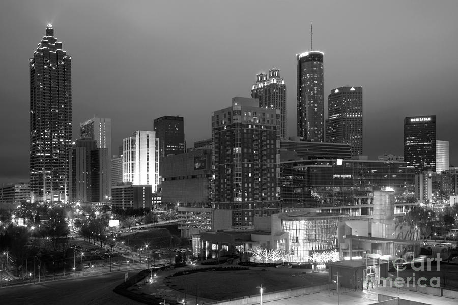 Aquarium and Atlanta Skyline at dusk 1 Photograph by Bill Cobb