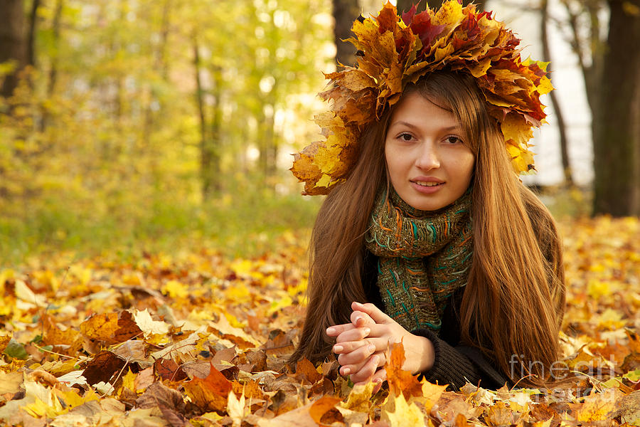 Girl In Yellow Leaves Crown Photograph by Aleksey Tugolukov