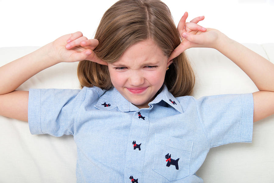 Girl With Her Fingers In Ears Photograph By Lea Paterson Fine Art America