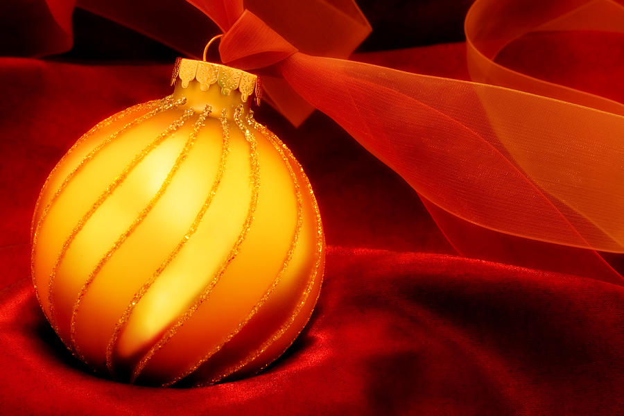 Christmas Photograph - Golden Ornament with Red Ribbons #2 by Carol Leigh