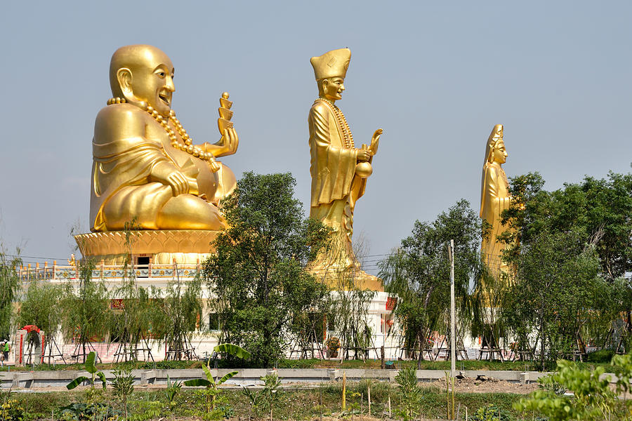 Golden Statues At The Chinese Cultural #1 Photograph by Robert Kennett