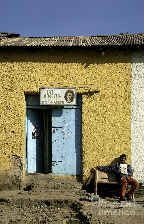 Gonder Ethiopia East Africa Man Relaxing Outside Colourful Barbe #1 Photograph by JM Travel Photography