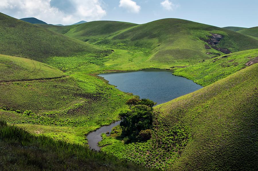 Grassy Hills And Lake #1 Photograph by K Jayaram