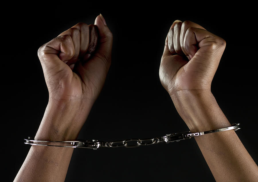 Handcuffed hands #1 Photograph by Juanmonino