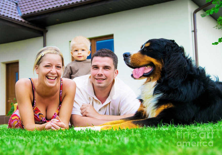 Happy family and house #1 Photograph by Michal Bednarek