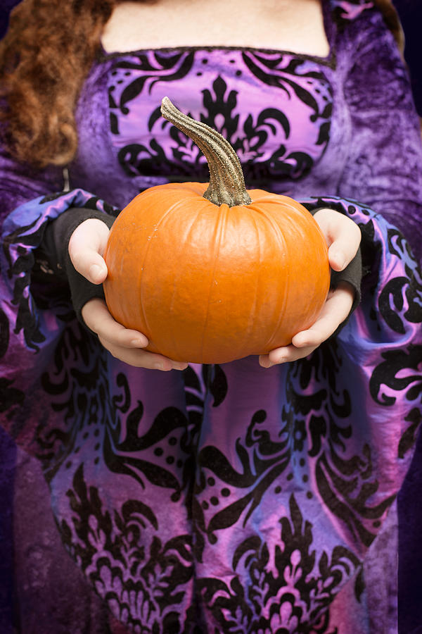 Holding Pumpkin #1 Photograph by Amanda Elwell
