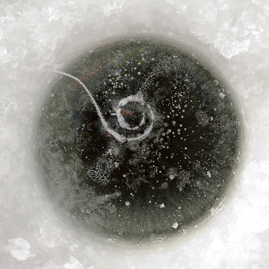 Ice fishing hole #3 Photograph by Steven Ralser