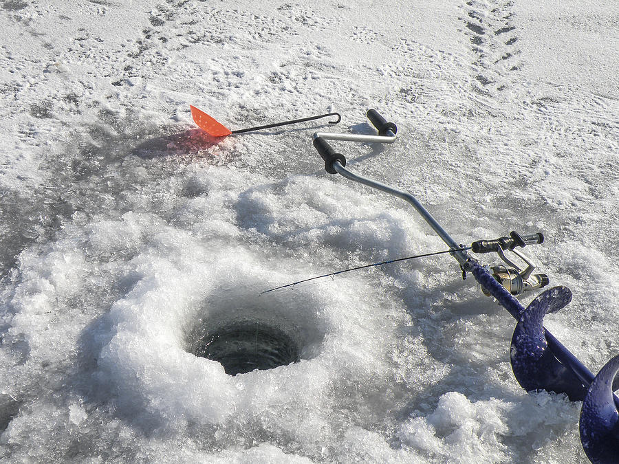Ice fishing #1 Photograph by Nick Mares