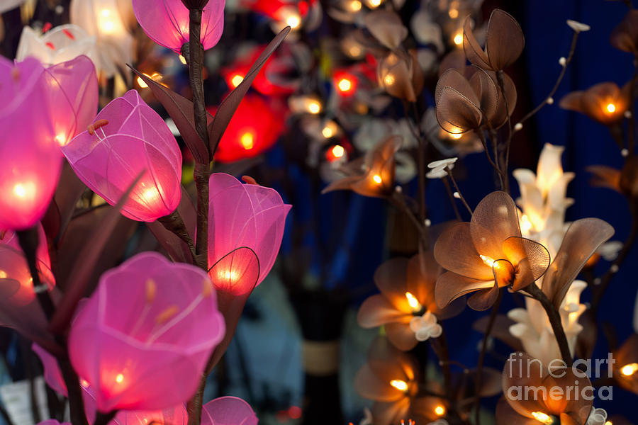Lamp Photograph - Illuminated Silk flowers in Bangkok Thailand #1 by Fototrav Print